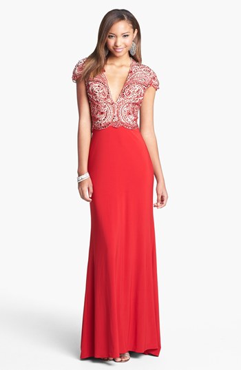 Red and nude embellished gown
