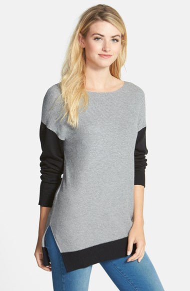 Grey sweater with black sleeves
