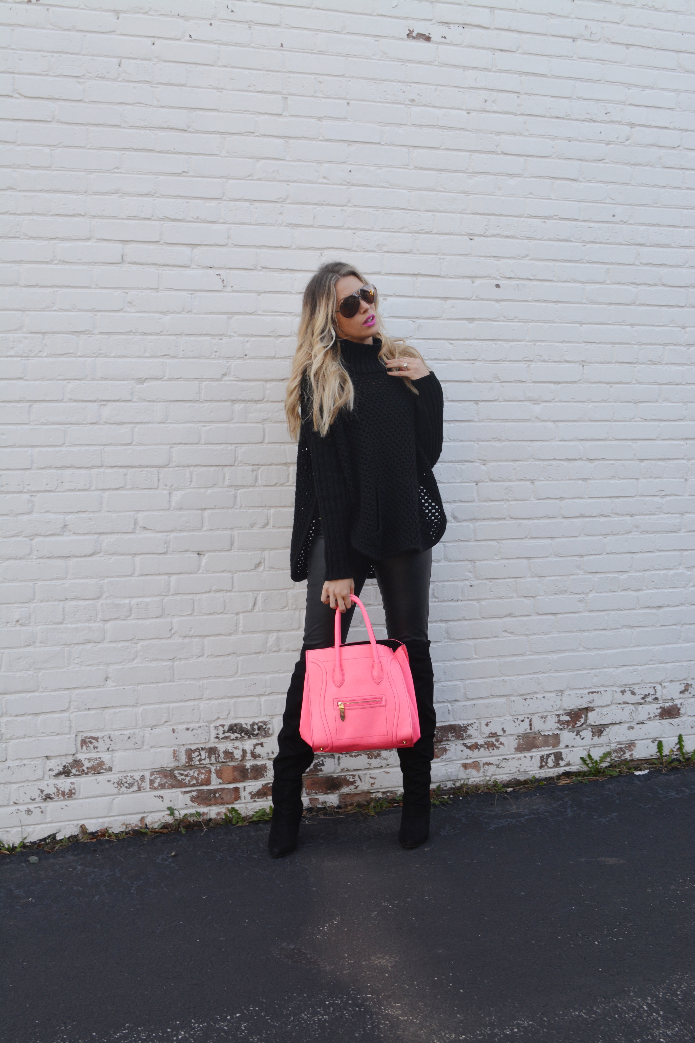 Fashion blogger wearing leather leggings