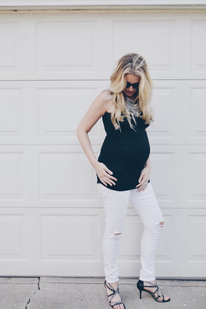 Pregnant Fashion Blogger in White Ripped Jeans, Statement Necklace and Black Isabella Oliver Tank Top