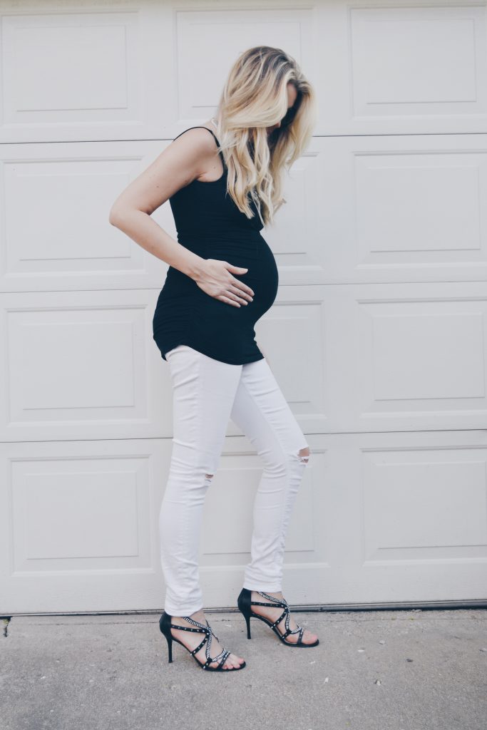 Pregnant Fashion Blogger in White Ripped Jeans, Statement Necklace and Black Isabella Oliver Tank Top