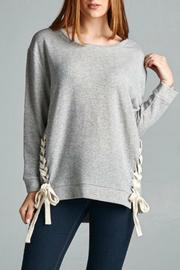 Grey sweatshirt with white lace up sides
