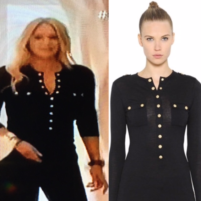 Adela King's Black Knit Shirt with Gold Buttons