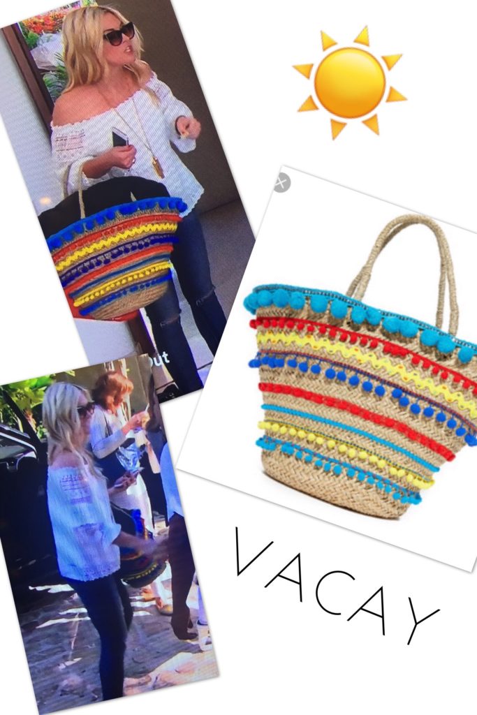 Tinsley Mortimer wearing a multi colored pom pom tote