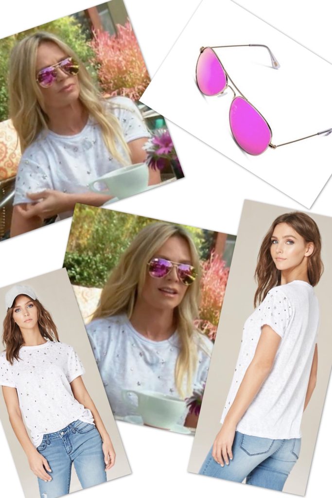 Tamra Judge wearing a white t shirt with silver star studs and pink aviator sunglasses