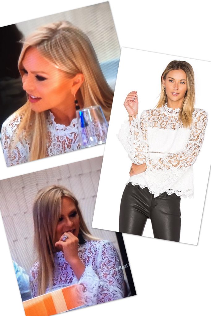 Tamra Judge wearing a white lace bell sleeve top
