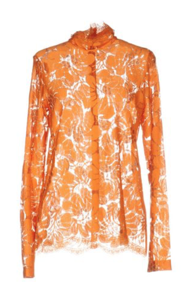 Delia Banai's Orange Lace Long Sleeved Top
