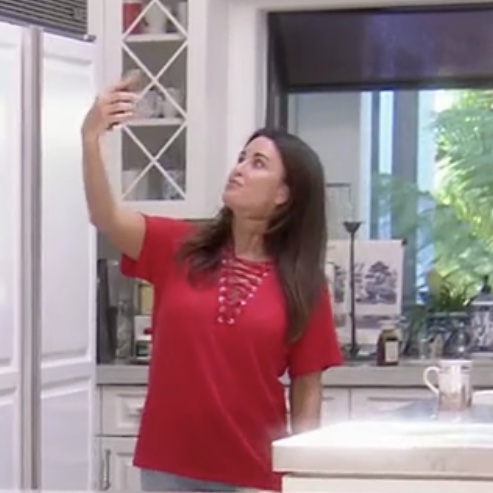 Kyle Richards' Red Lace Up Top