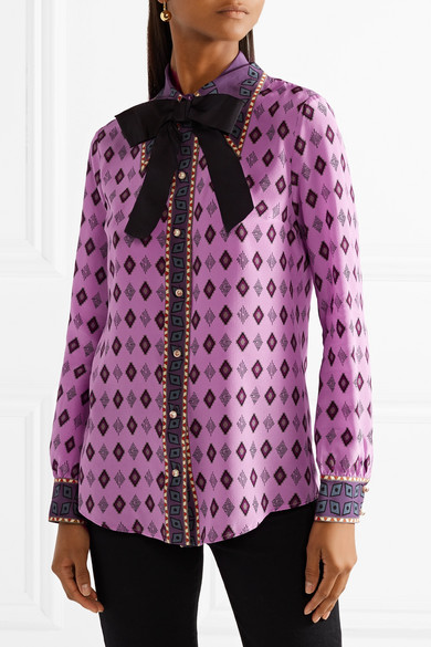 Kyle Richards' Purple Printed Blouse with Pearl Embellishment