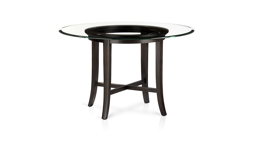 Robyn Dixon's Round Glass Top Dining Table