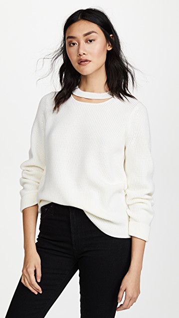 Kris Jenner's White Ribbed Cutout Sweater