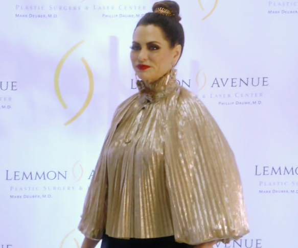 D'Andra Simmons' Gold Pleated Blouse