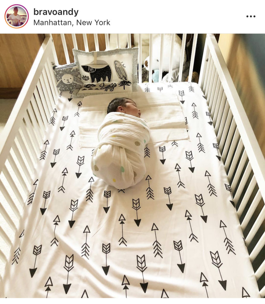 Andy Cohen’s Black and White Arrows Baby Crib Sheet On Instagram