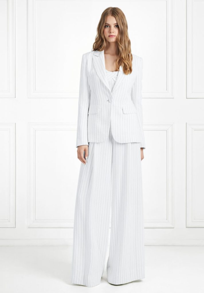 Tracy Tutor’s White Pinstripe Suit
