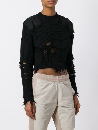 Erika Jayne Girardi's Black Distressed Sweater