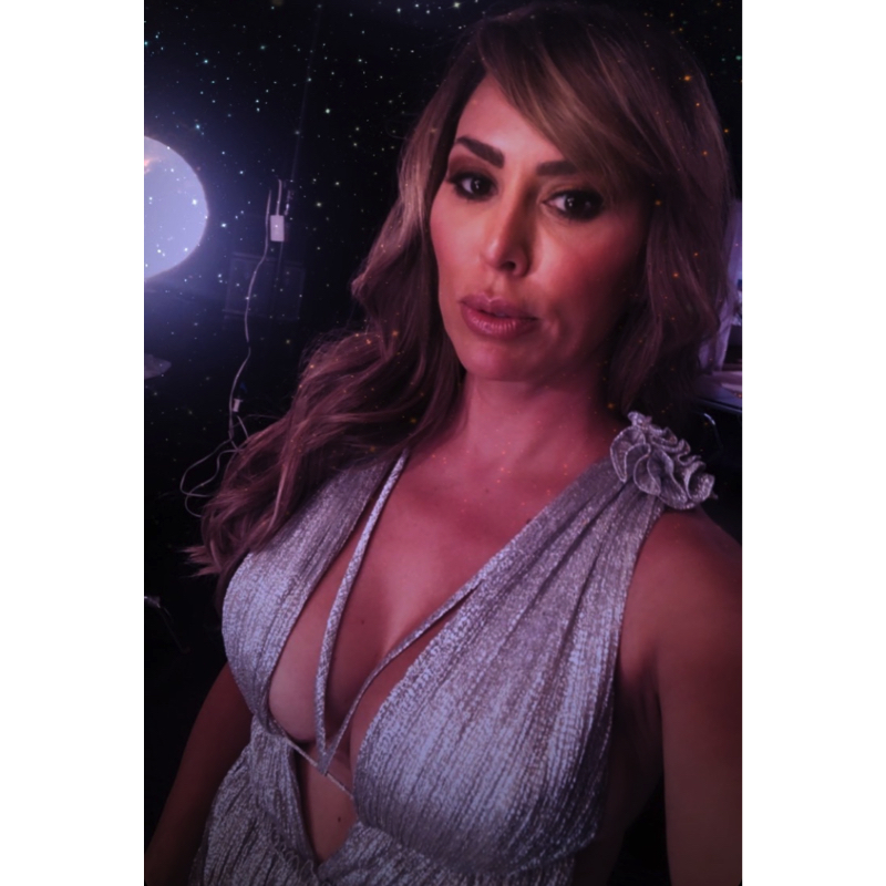 Kelly Dodd’s Silver Pleated Gown