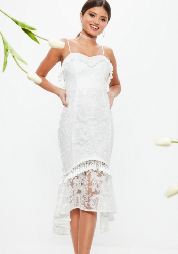 Brittany Cartwright's White Lace Tassel Dress