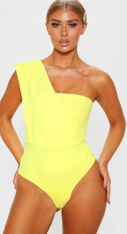 Amanda Batula’s Yellow One Shoulder Confessional Bodysuit