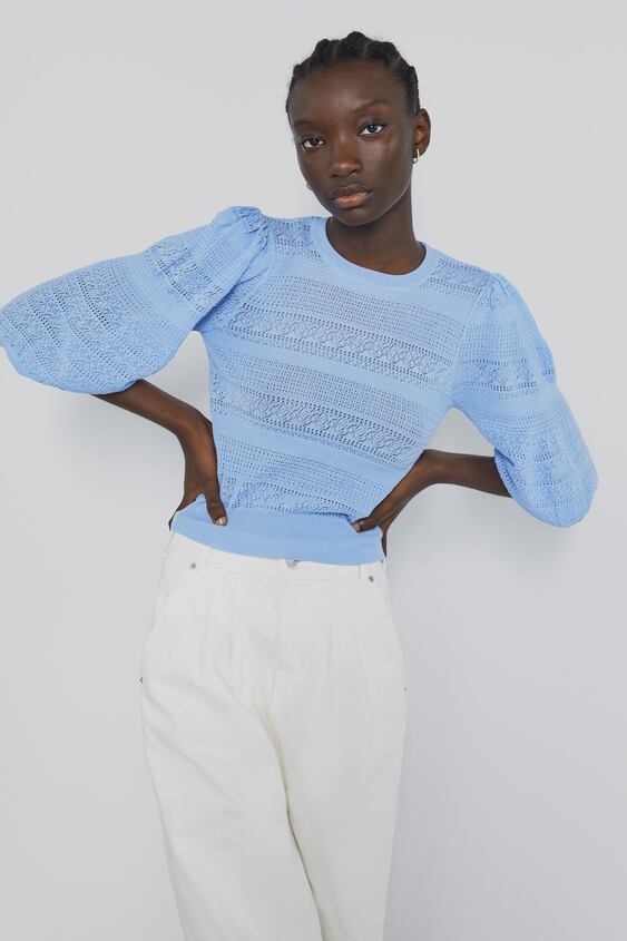 Kenya Moore's Light Blue Puff Sleeve Sweater