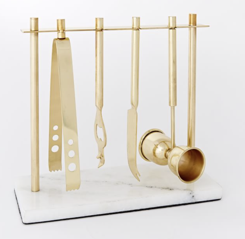 Garcelle Beauvais' Gold Bar Tools on Her Bar Cart