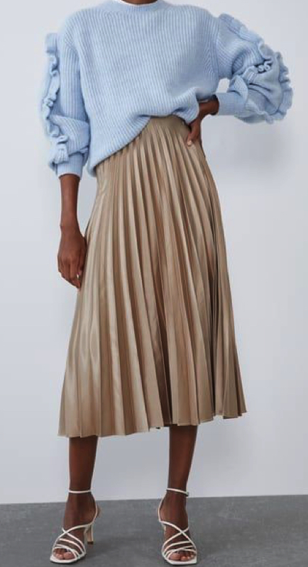 Leah McSweeney s Gold Pleated Skirt Big Blonde Hair