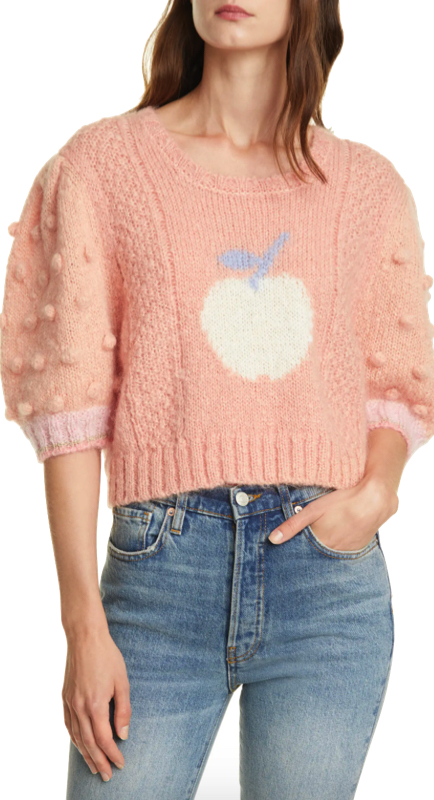 Bethenny Frankel’s Pink Bauble Sleeve Apple Sweater