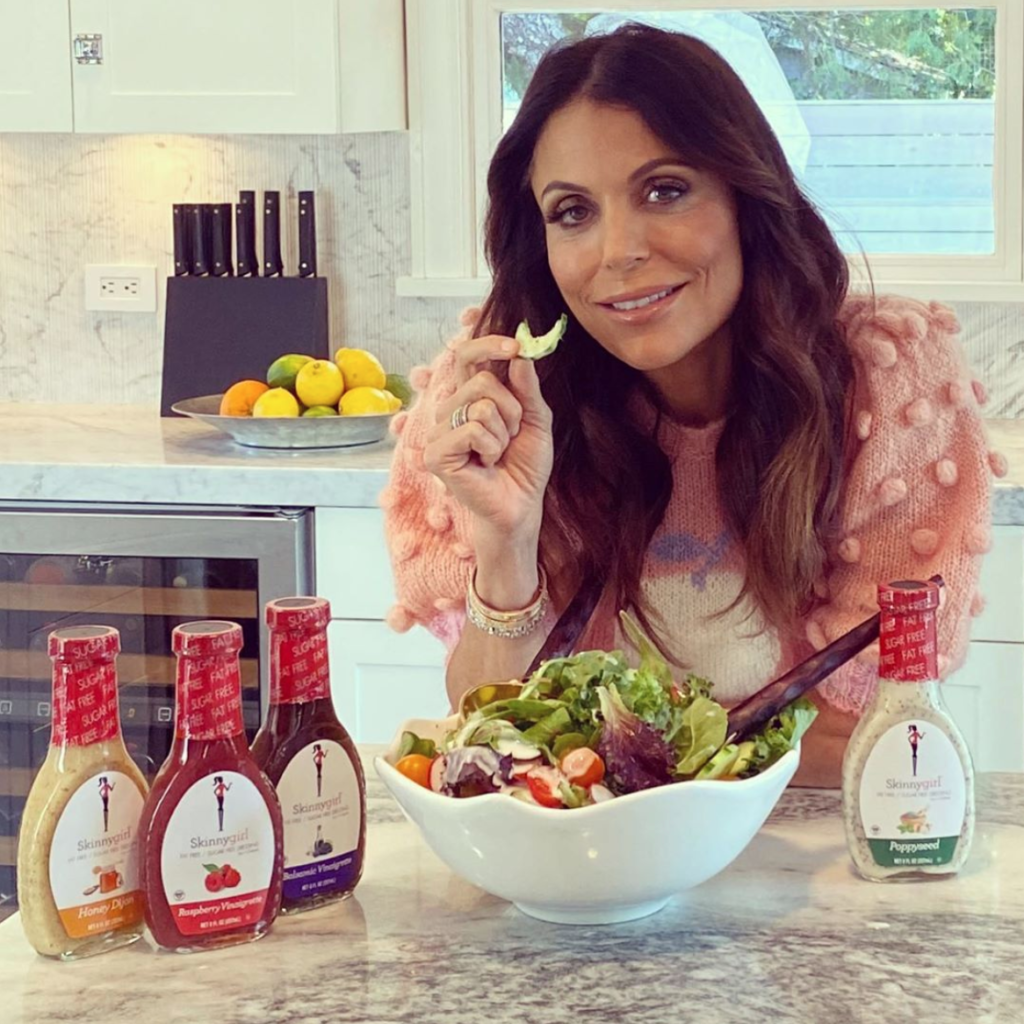 Bethenny Frankel’s Pink Bauble Sleeve Apple Sweater | Big Blonde Hair
