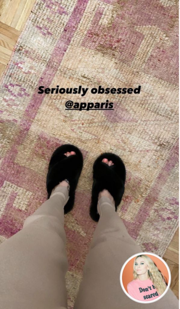 Leah McSweeney's Black Fur Slippers