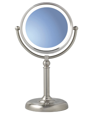 Jennifer Aydins' Silver Vanity Mirror Doing Her Makeup