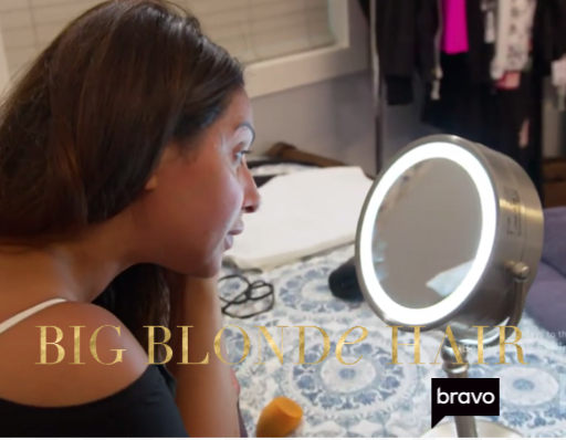 Jennifer Aydins' Silver Vanity Mirror Doing Her Makeup