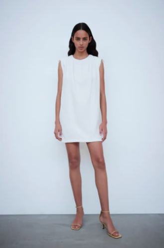 Kenya Moore's White Sleeveless Dress