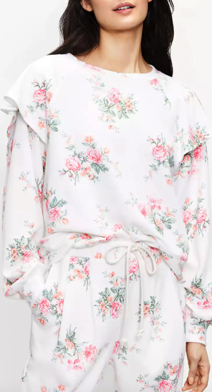 Crystal Kung Minkoff’s White Floral Ruffle Sweatshirt