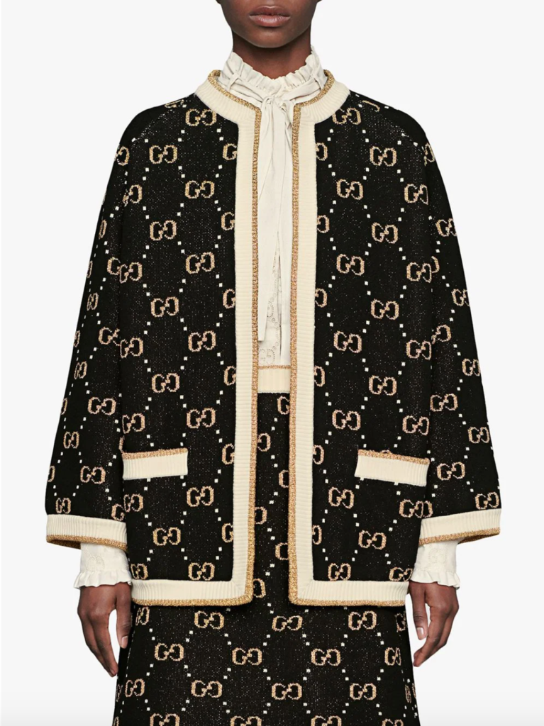 Garcelle Beauvais' Black and Gold Logo Cardigan