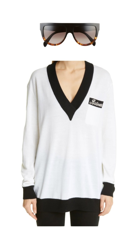Askale Davis' White V Neck Sweater
