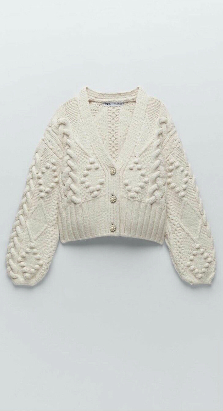 Garcelle Beauvais’ Ivory Pearl Button Cardigan