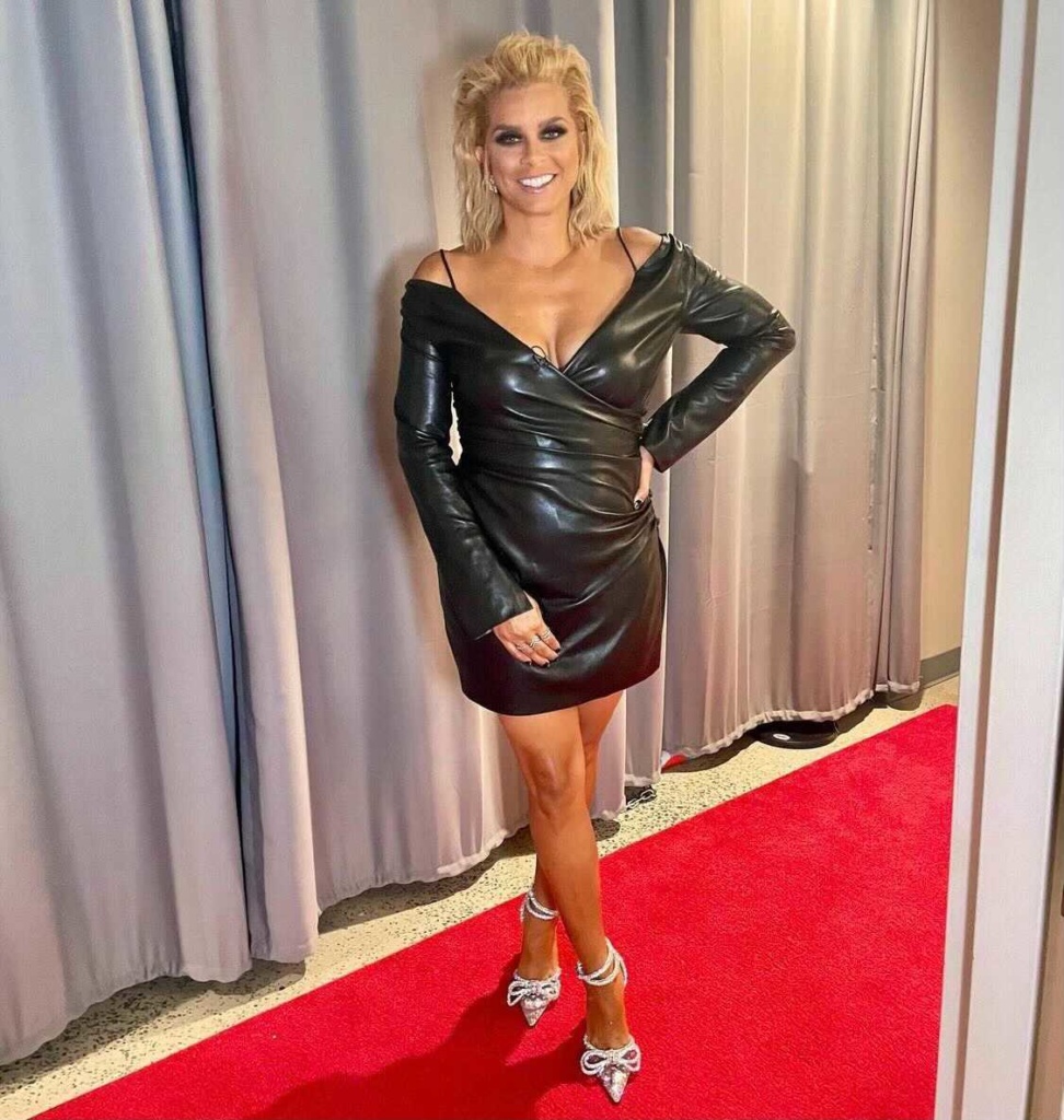 Robyn Dixon's Black Leather Dress and Bow Heels