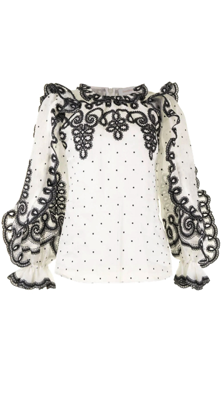 Sutton Stracke’s Black and White Embroidered Top