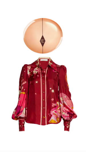 Kyle Richards' Gold Compact and Red Printed Blouse