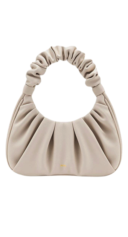 Paige DeSorbo’s White Ruched Bag 1