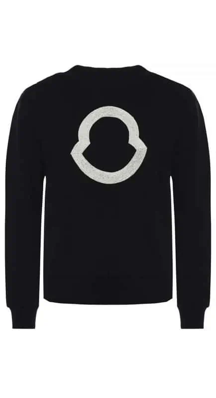 Angie Harrington’s Black Logo Sweatshirt