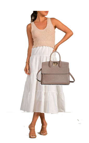 Dolores Catania's Beige Sweater Tank Top and White Skirt
