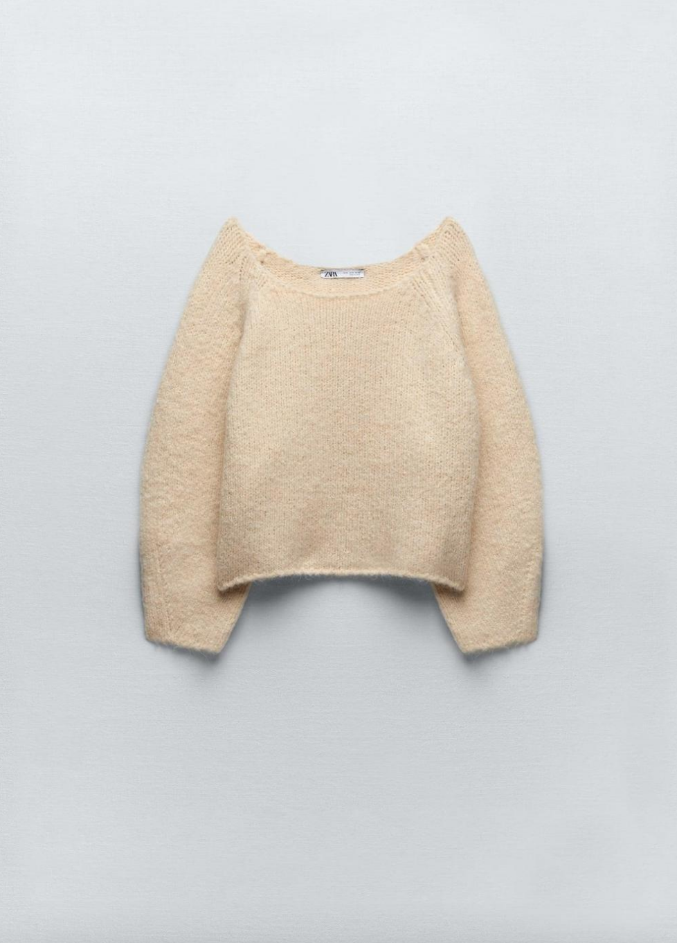 Madison LeCroy's Tan Off The Shoulder Sweater