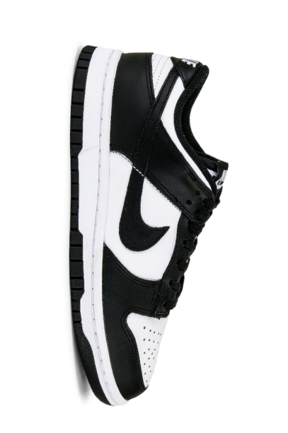 Nicole Martin's Black and White Nike Sneakers