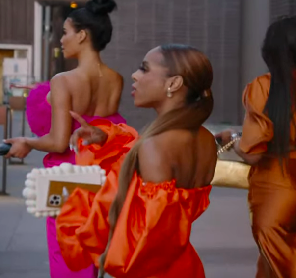 Candice Dillard's Orange off the Shoulder Dress