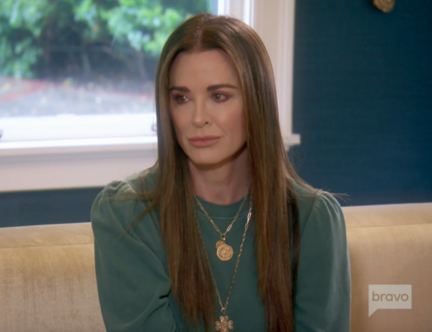 Kyle Richards' Teal Puff Sleeve Sweatshirt