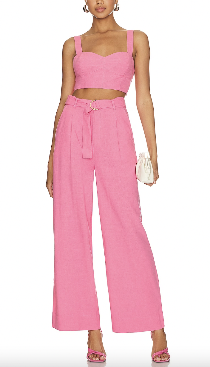 Nicole Martin's Pink Cropped Top and Belted Pants