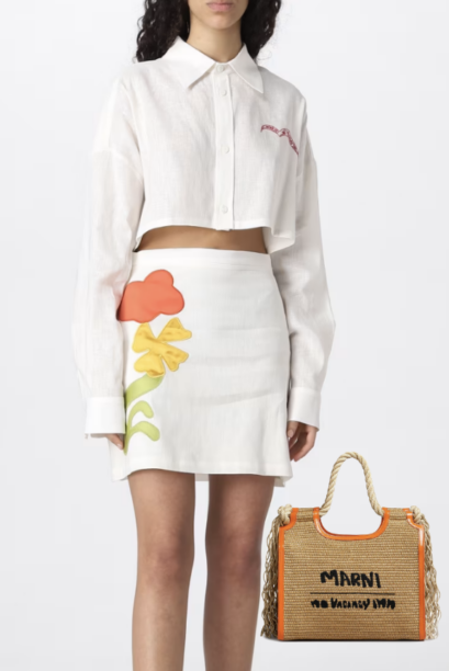 Sutton Stracke's White Skirt and Crop Top