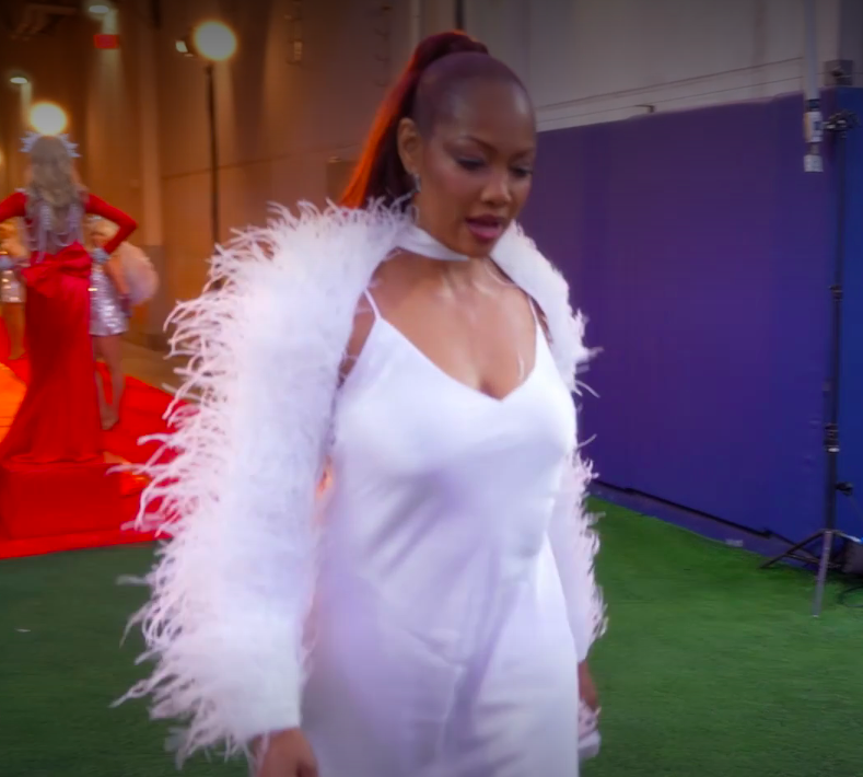 Garcelle Beauvais' White Satin Dress and Feather Shawl