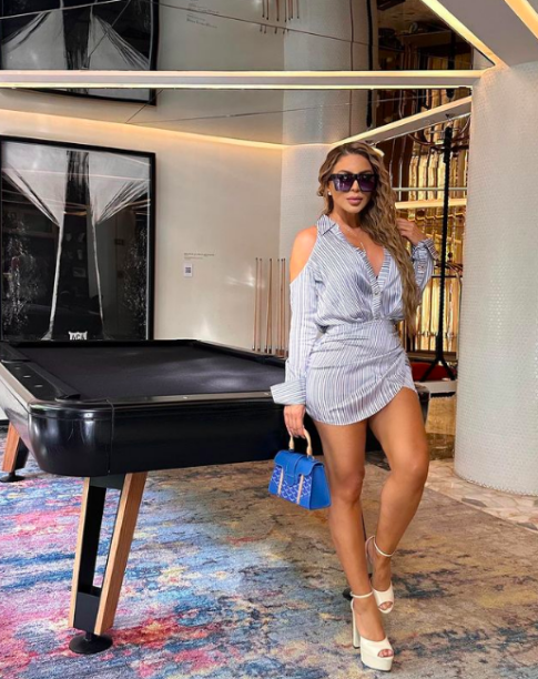 Larsa Pippen's Blue and White Striped Shirt Dress