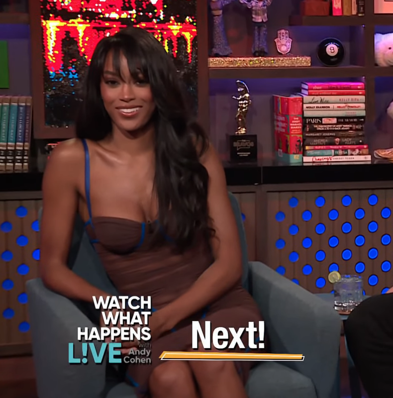 Ciara Miller's Brown Ruched Dress with Blue Trim on WWHL
